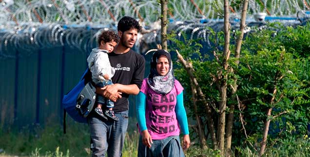 Eine geflüchtete Familie bei Kelebija an der serbisch-ungarischen Grenze: Wie lassen sich die Ursachen für die Flucht beseitigen? (Foto: pa/Ilic)