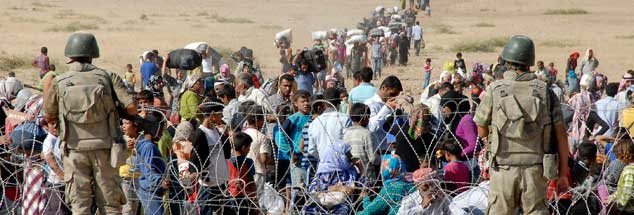 Flüchtlinge an der syrisch-türkischen Grenze: Nur durch Waffengewalt wird es nicht gelingen, den Nahen Osten zu befrieden (Foto: Stringer Turkey/Reuters)