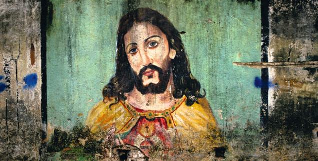 Wesenseins mit Gott? Jesus Christus als Wandgemälde in den Slums der indischen Stadt Chennai. (Foto: Alamy Stock Photo / India-Chennai / Shaun Higson)